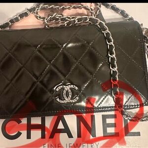 Chanel Black Quilted Clutch with Silver Chain